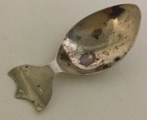 A rare French silver caddy spoon. Circa 1800.