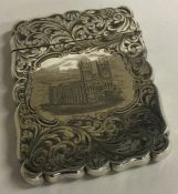 A Victorian engraved silver castle top card case depicting Westminster Abbey.