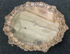 A large 18th Century Georgian silver salver with shell border.