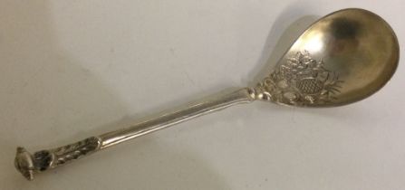 A Continental silver engraved spoon.