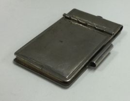 A silver plated hinged note holder.