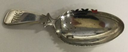 A Georgian silver caddy spoon. London 1811.