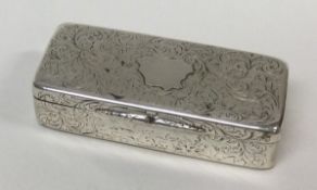 A Victorian silver snuff box with engraved decoration and stag to back.