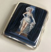 A Victorian silver and enamelled cigarette case depicting theatre performing scene.