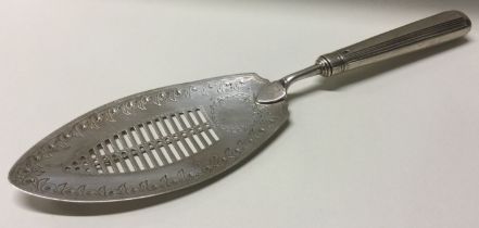 A Georgian silver fish slice. London 1797.