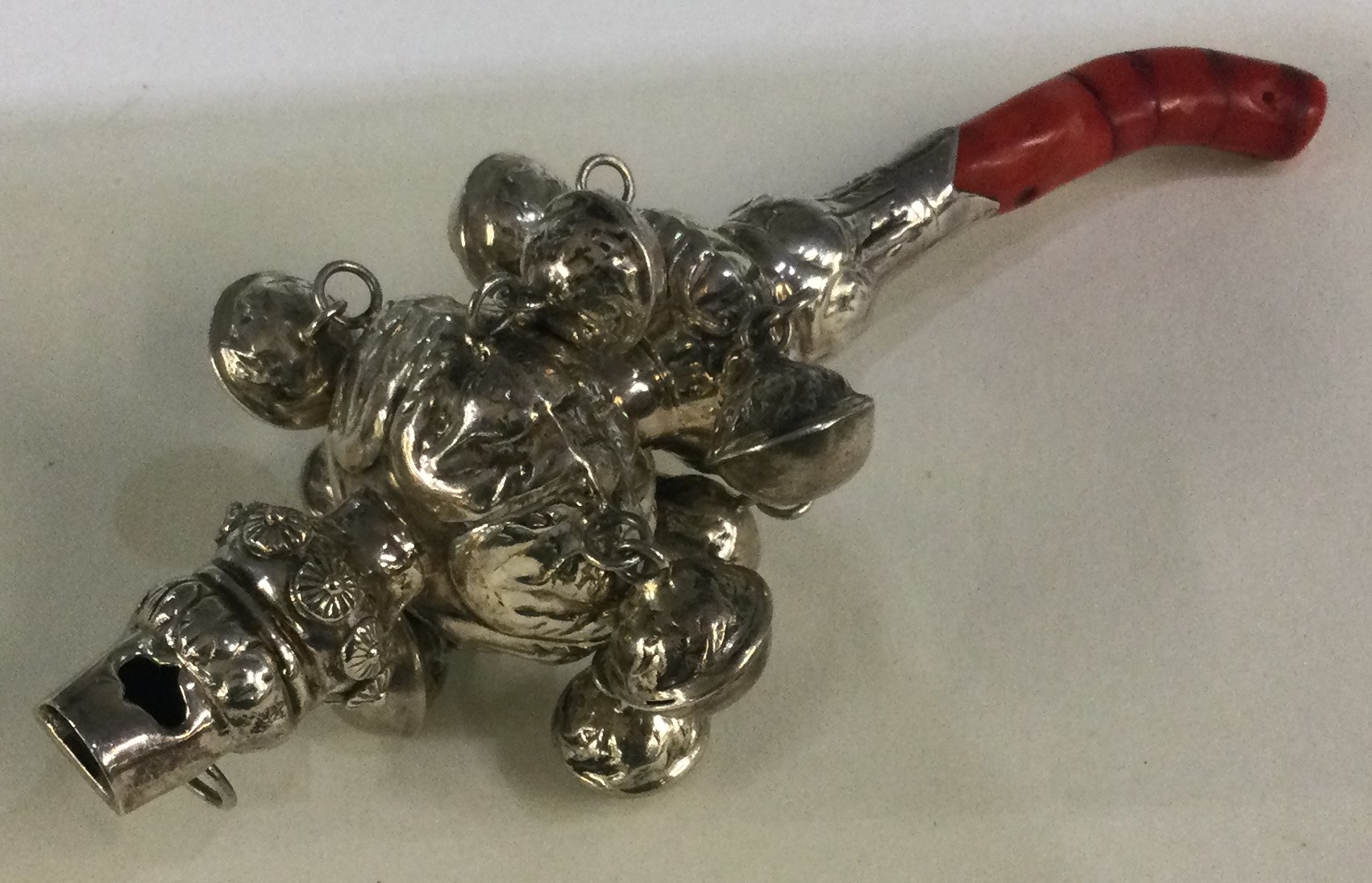 A Georgian silver rattle mounted with coral teether. - Image 2 of 2