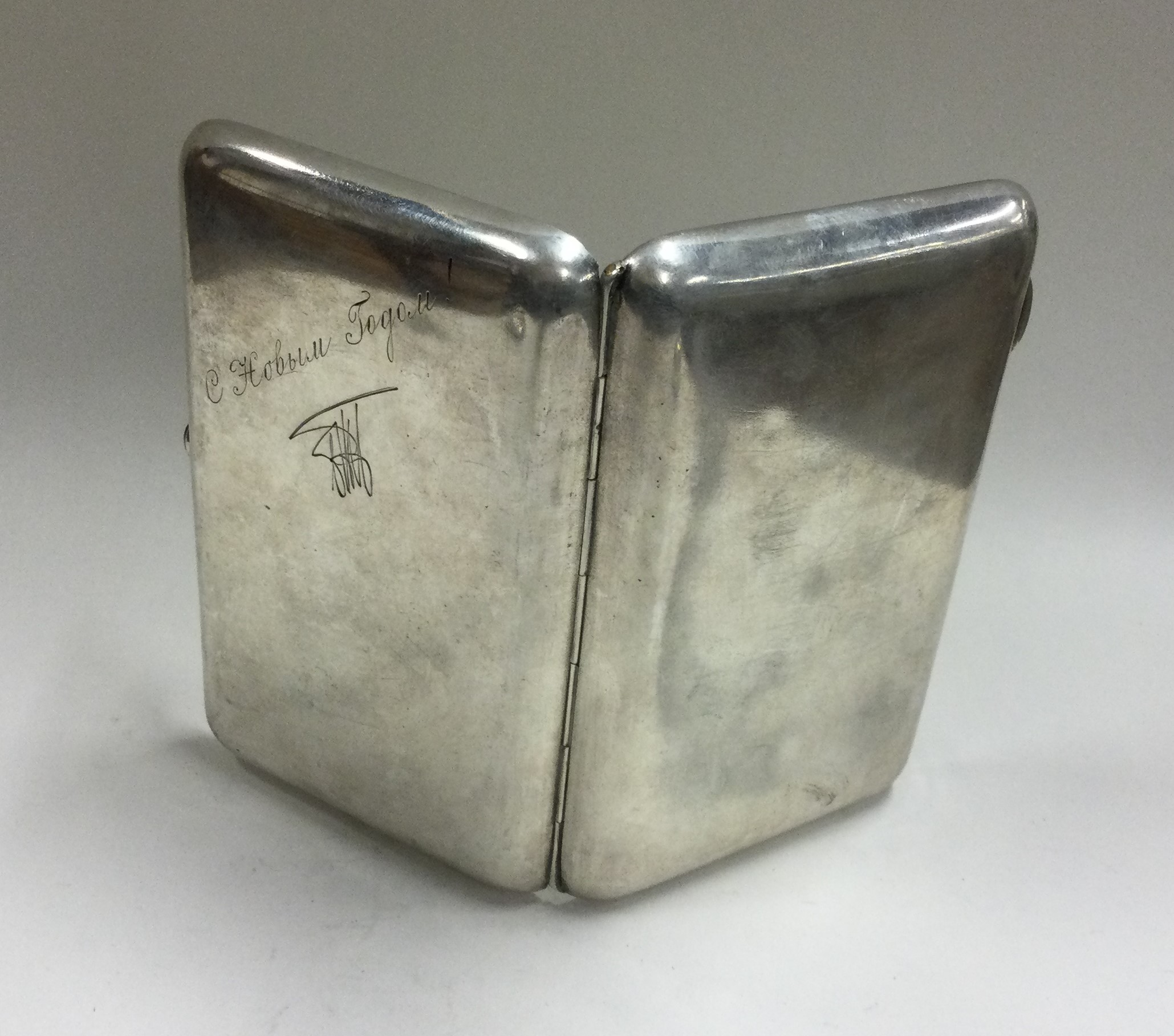 An early 20th Century Russian silver cigarette case. - Image 2 of 2