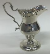 CHESTER: A Georgian style silver cream jug. 1901.