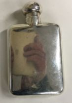 A silver flask with screw-top lid. London 1903.