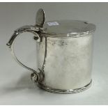 An early 18th Century Georgian silver mounted glass mustard pot.