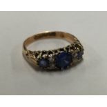 A good quality Victorian sapphire and diamond seven stone half hoop ring.