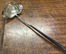 A 19th Century silver toddy ladle with coin centre.