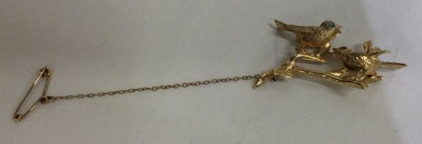 An unusual 9 carat diamond love birds brooch.