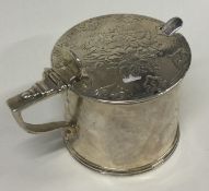 A Victorian silver and glass mustard pot. London 1859.