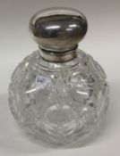 A silver and hobnail cut glass scent bottle.