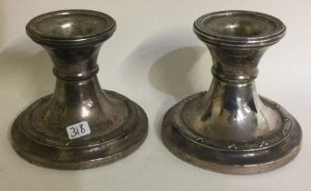 A pair of silver candlesticks. Birmingham 1997.