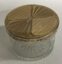 A silver and enamelled crystal glass box. Birmingham 1930.