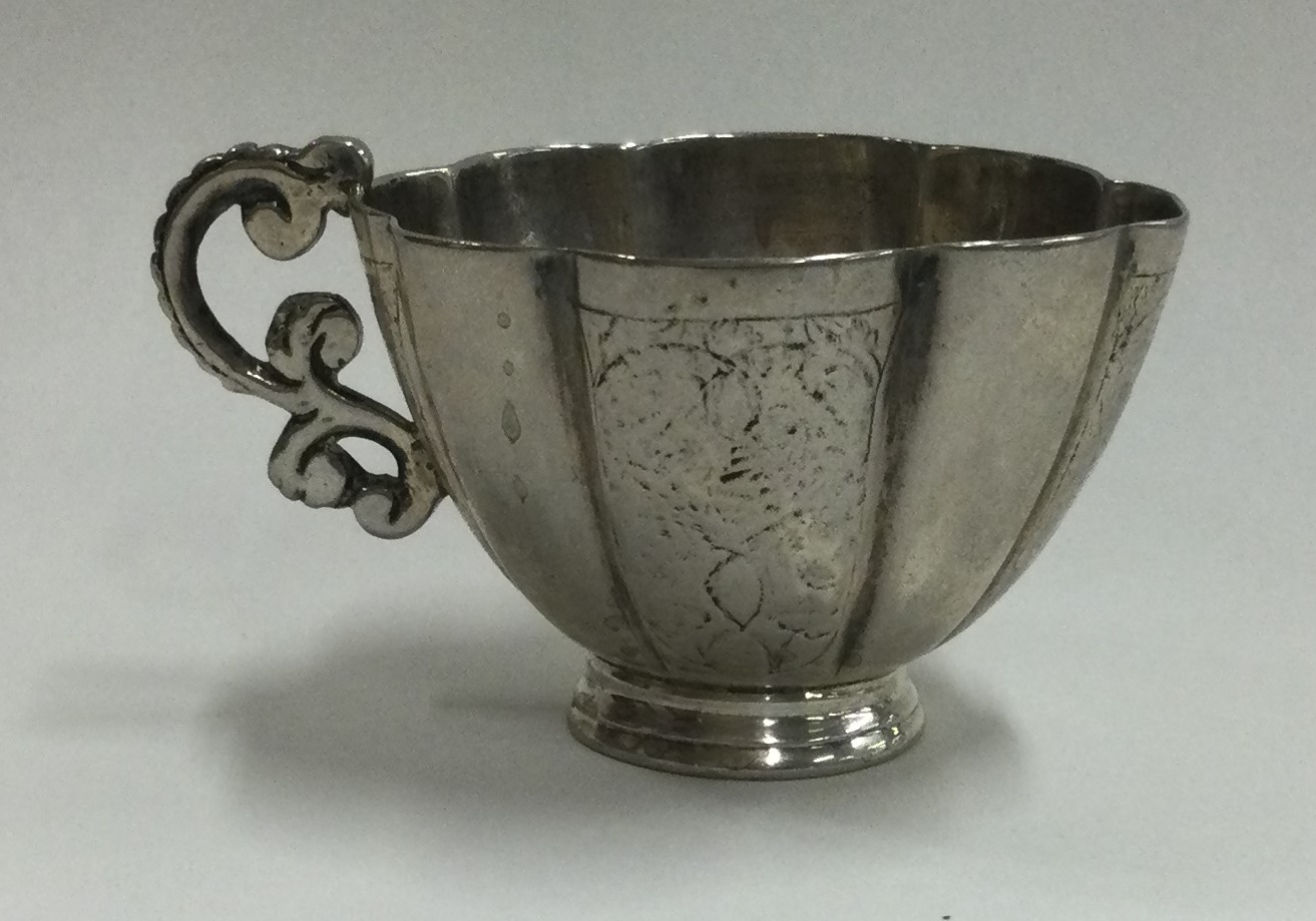 A Continental 18th Century silver Charka / vodka tot.