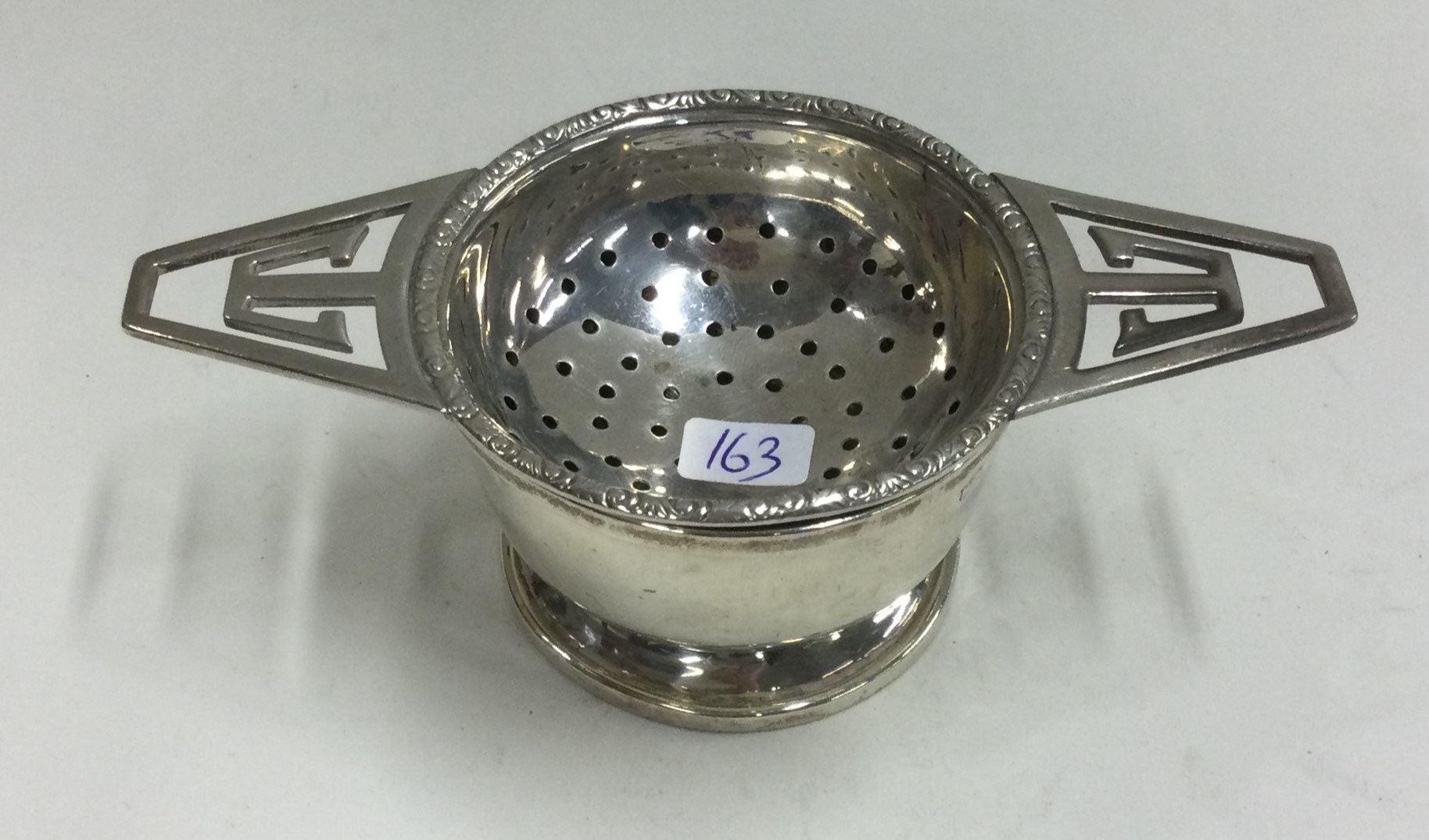 A silver tea strainer on stand. Birmingham. - Image 2 of 2