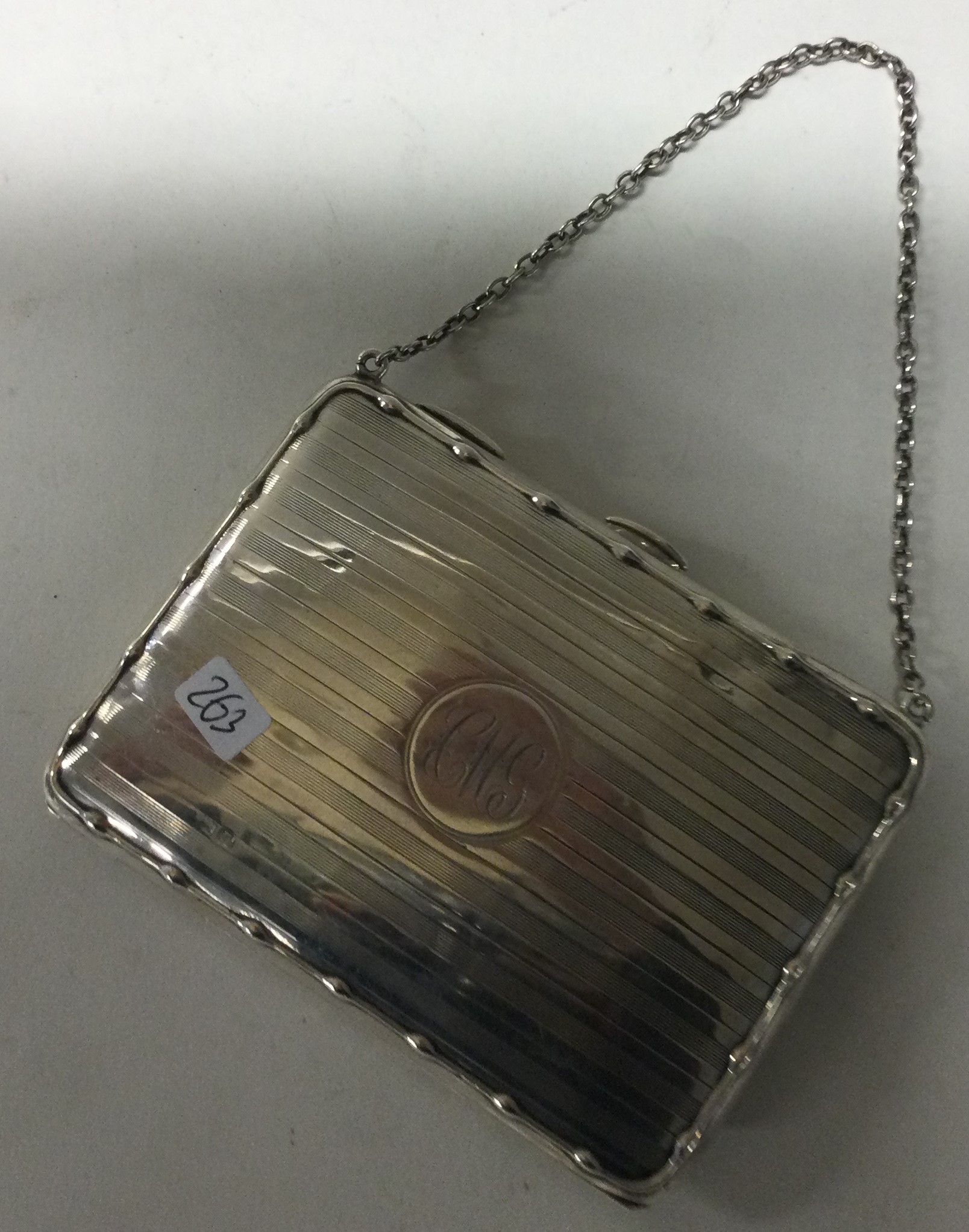 A silver card case with suspension chain. Birmingham 1916. - Image 2 of 2