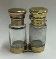 A Victorian silver mounted glass scent bottle.