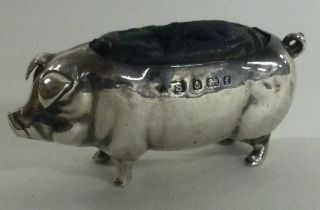 An Edwardian silver pin cushion in the form of a pig. Birmingham 1905.