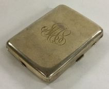 A heavy Antique Continental silver combination business holder / compact.
