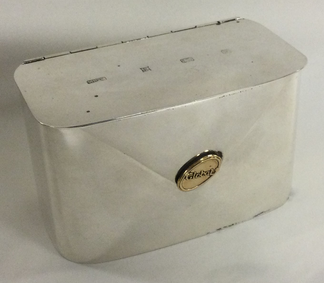 A rare silver and gold mounted novelty tea caddy. Birmingham 1997.