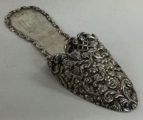 A large Victorian silver shoe with chased decoration. Birmingham 1900.