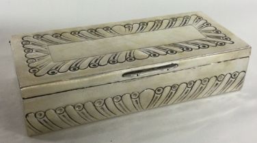 An American silver jewellery box with chased lid.