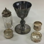 Two silver napkin rings together with a plated goblet etc.