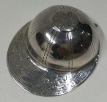 A silver caddy spoon in the form of a jockey cap. Birmingham 1798. By Joseph Taylor.