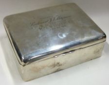 A heavy silver rectangular cigarette box. Birmingham.