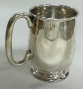 A silver half pint mug. Sheffield 1959. By Emilie Viner.