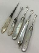 A collection of silver and MOP manicure items.