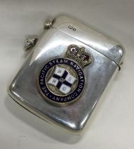 CHESTER: A silver vesta case with enamelled Pacific Steam Navigation crest.