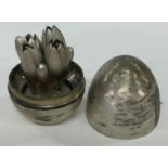 A contemporary English silver 'Surprise' egg. Marked to base.