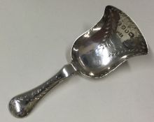 A silver caddy spoon. Birmingham 1856. By Thomas Dones.