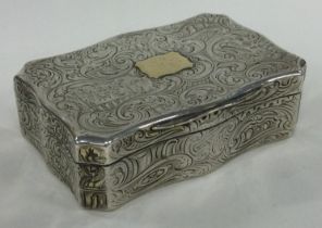A heavy engraved silver snuff box decorated with flowers and rabbit. London 1839.