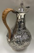 A George III silver coffee jug with wicker covered handle. London 1784. By Wakelin & Taylor.