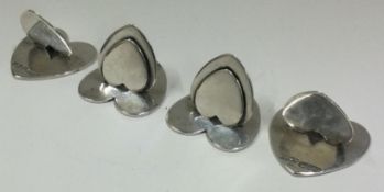 CHESTER: A good set of heart shaped silver menu holders. By SM&Co.