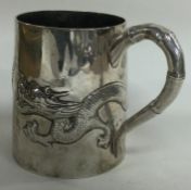 A Chinese export silver mug. Marked to base. Circa 1900. By KMS.