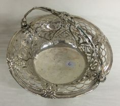 An 18th Century silver swing handled basket. Maker and Lion marks only. By Thomas Pitts.
