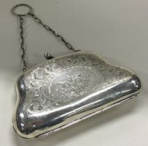 A silver purse with swag decoration. Birmingham. Circa 1910.