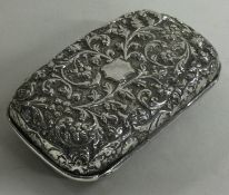 An Indian Colonial chased silver jewellery box.