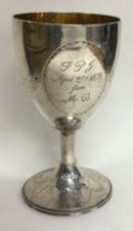 A heavy Georgian silver goblet engraved with flowers. Incuse mark. London 1785.