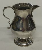 An 18th Century Georgian silver sparrow beak cream jug. London 1741.