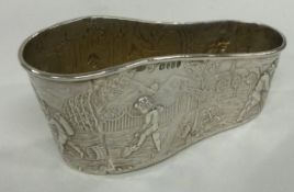 A 19th Century silver basket with chased decoration bearing import marks.