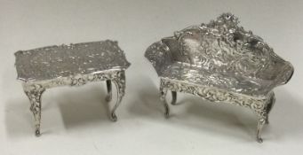 CHESTER: A miniature silver sofa and table. 1900.