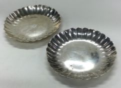 PUIFORCART: A pair of French silver dishes of fluted design.